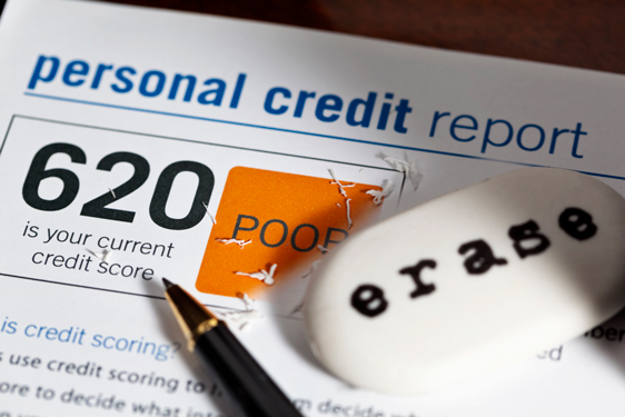 credit report with big eraser